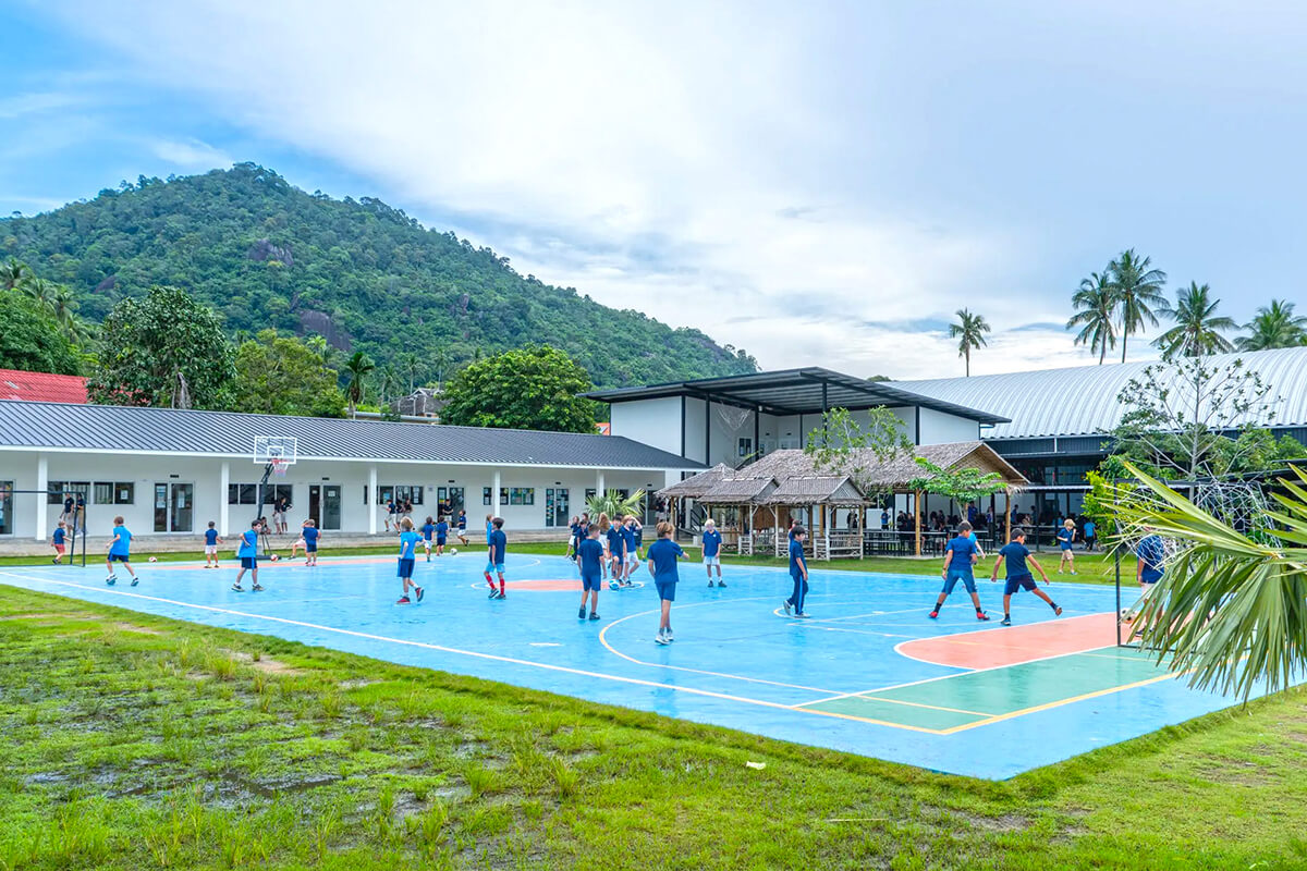 Photo of an outdoor sports court at the Windfield International School.