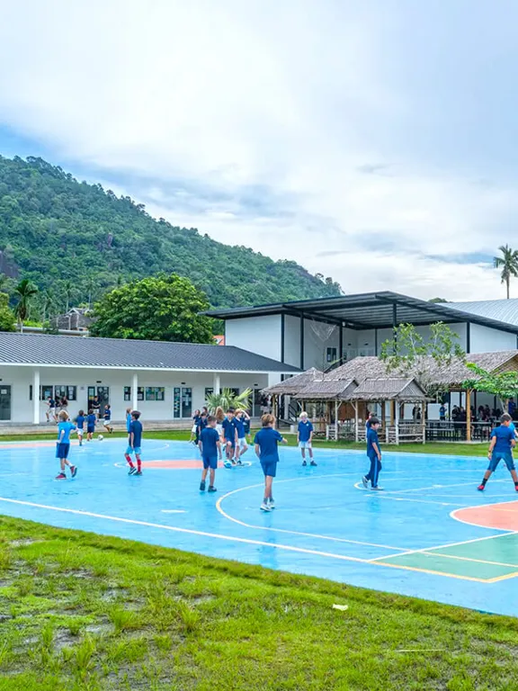 Photo of an outdoor sports court at the Windfield International School.